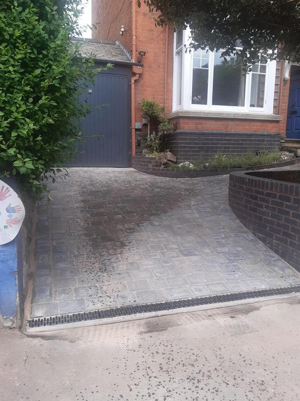 curved and rising block paving